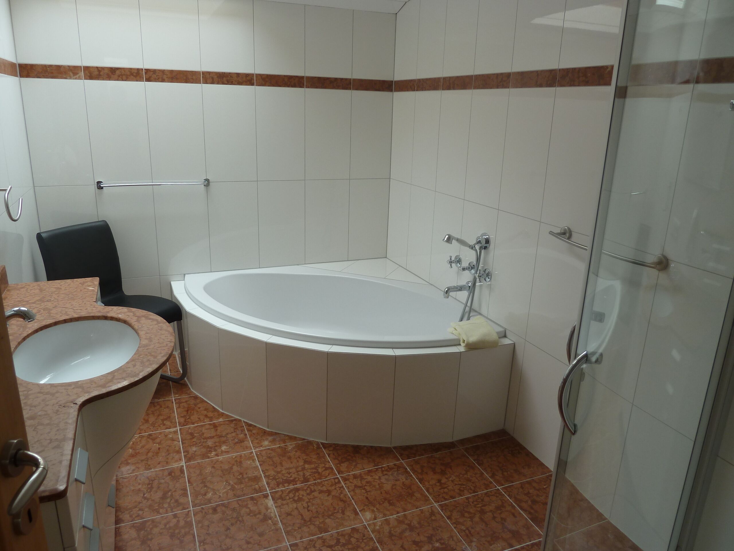 penthouse | bathroom | shower, hair dryer, towels