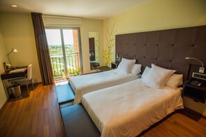 Select Comfort beds, free minibar, in-room safe, desk