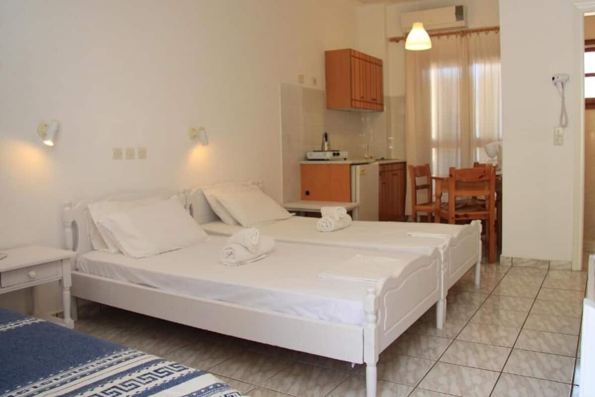 Premium bedding, desk, blackout drapes, iron/ironing board