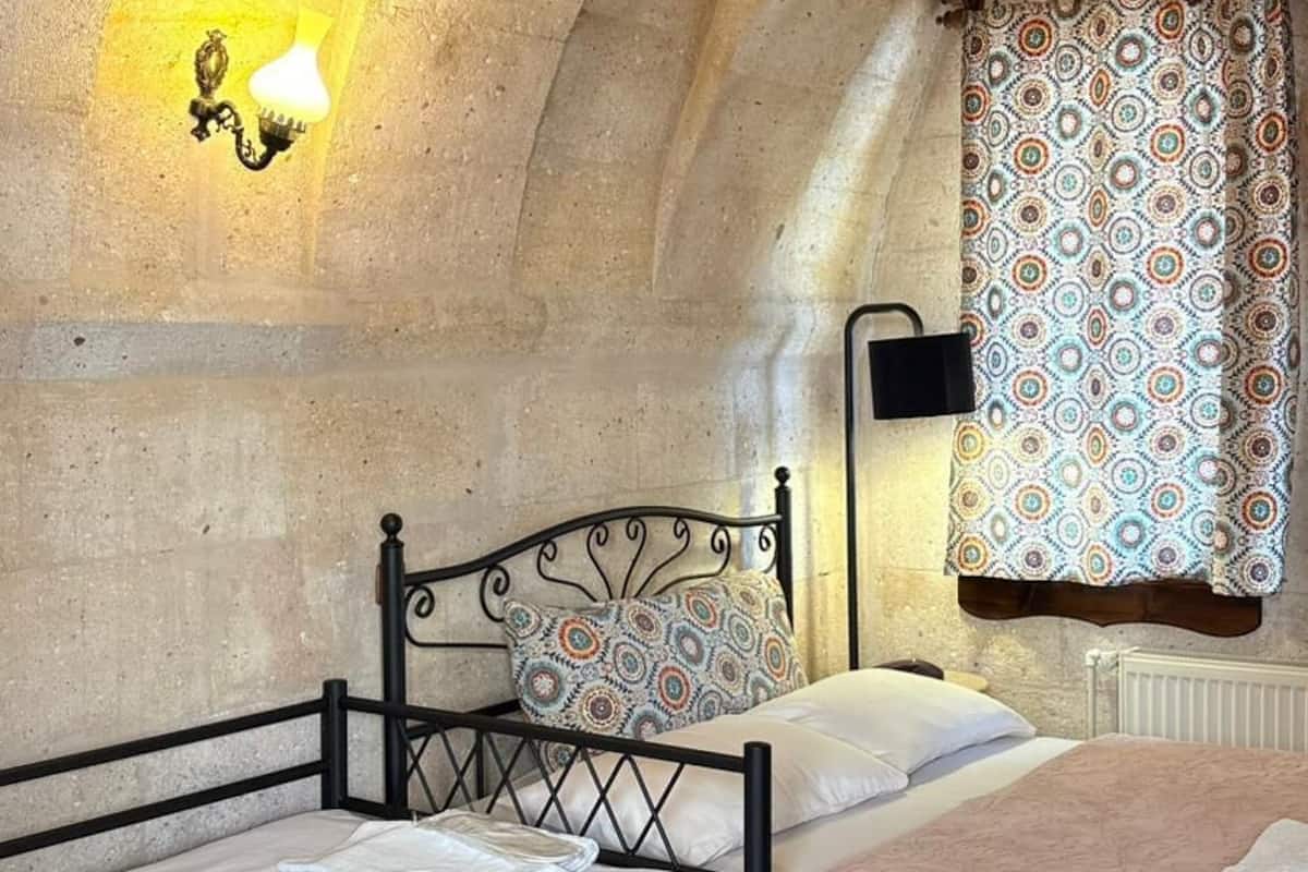 Family triple arch room | Premium bedding, soundproofing, iron/ironing board, free WiFi