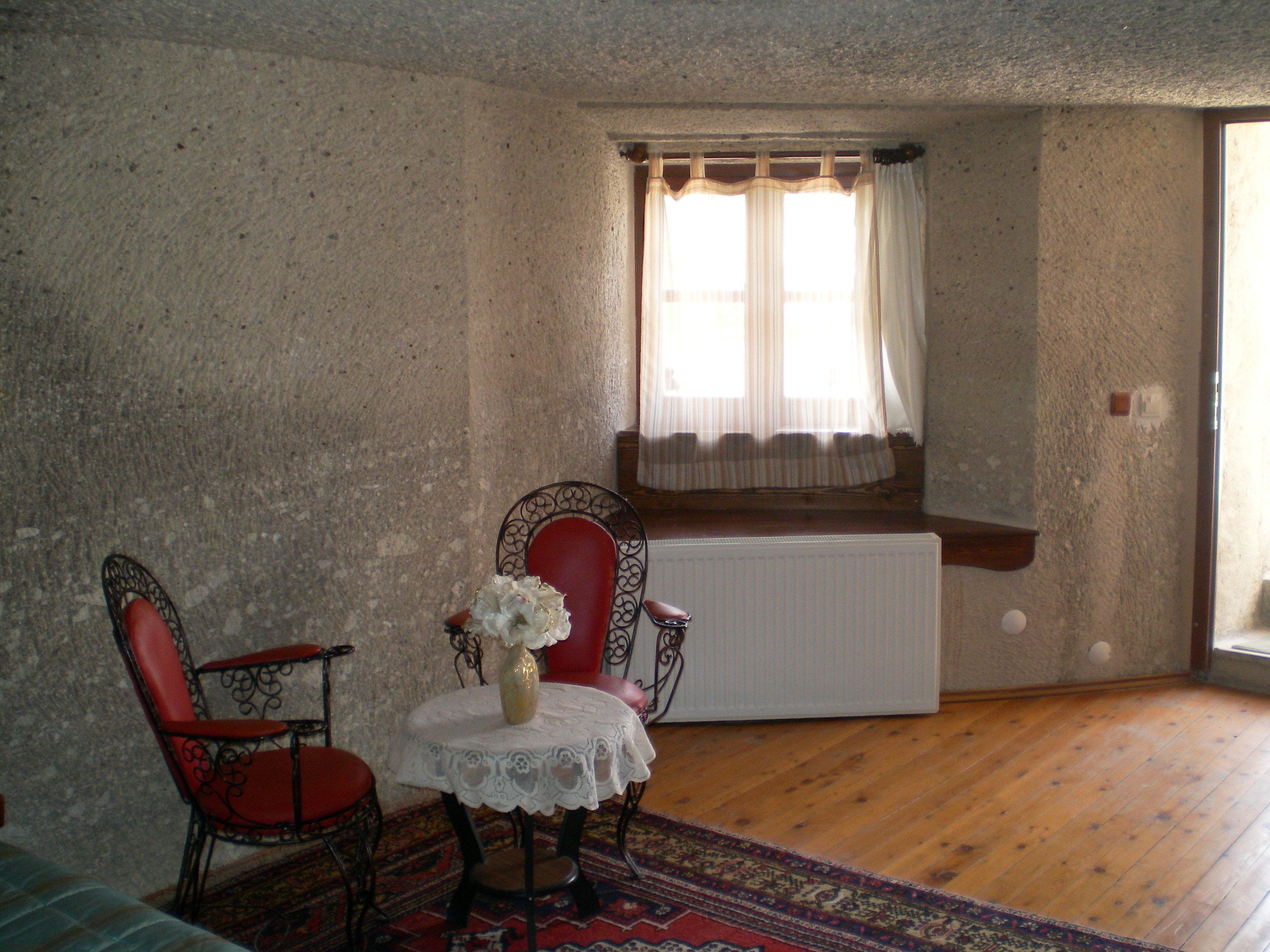 family triple deluxe cave room | living area | 55-cm lcd tv with satellite channels, tv