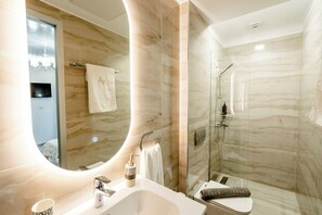 Superior Room | Bathroom | Shower, designer toiletries, hair dryer, slippers