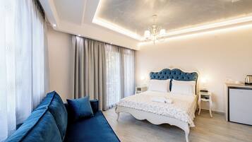 Superior kamer | Luxe beddengoed, een minibar, een kluis op de kamer