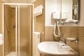 Basic Quadruple Room, 1 Bedroom | Bathroom | Shower, rainfall showerhead, free toiletries, hair dryer