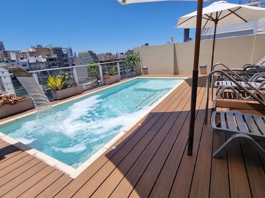 Outdoor pool, pool umbrellas, sun loungers