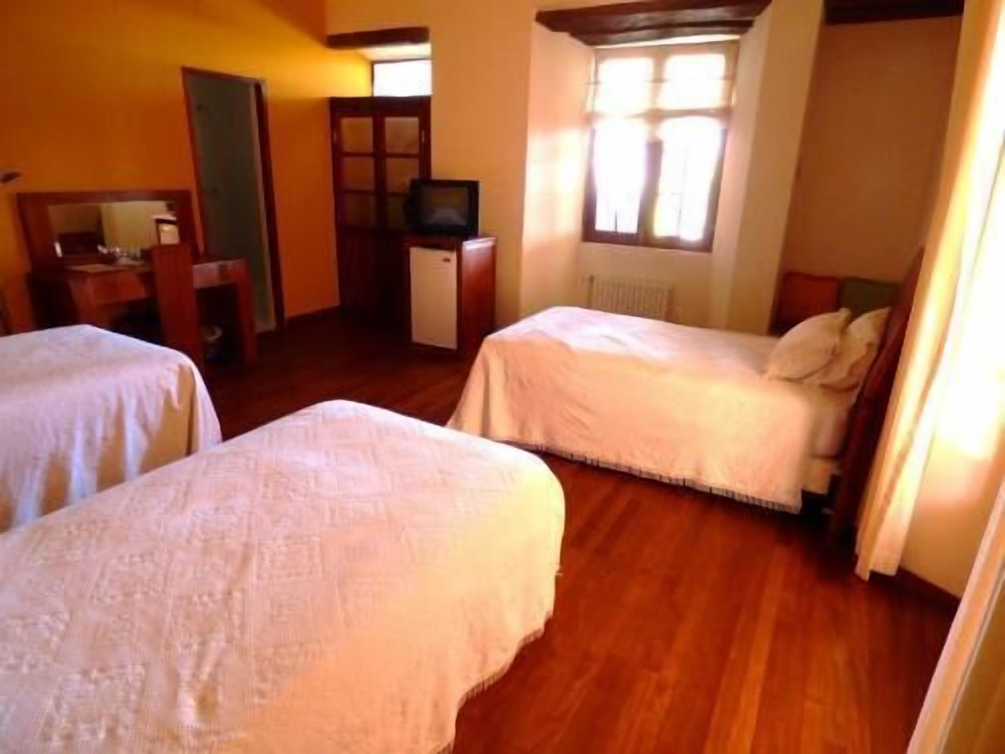Copriletto in piuma, materassi Select Comfort, minibar