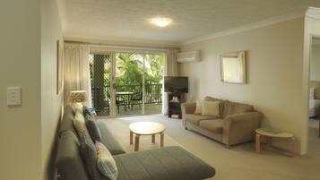 32-inch flat-screen TV with digital channels, TV, DVD player