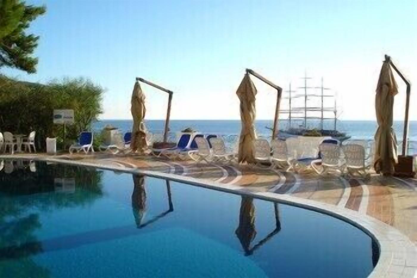 2 outdoor pools, pool umbrellas, pool loungers