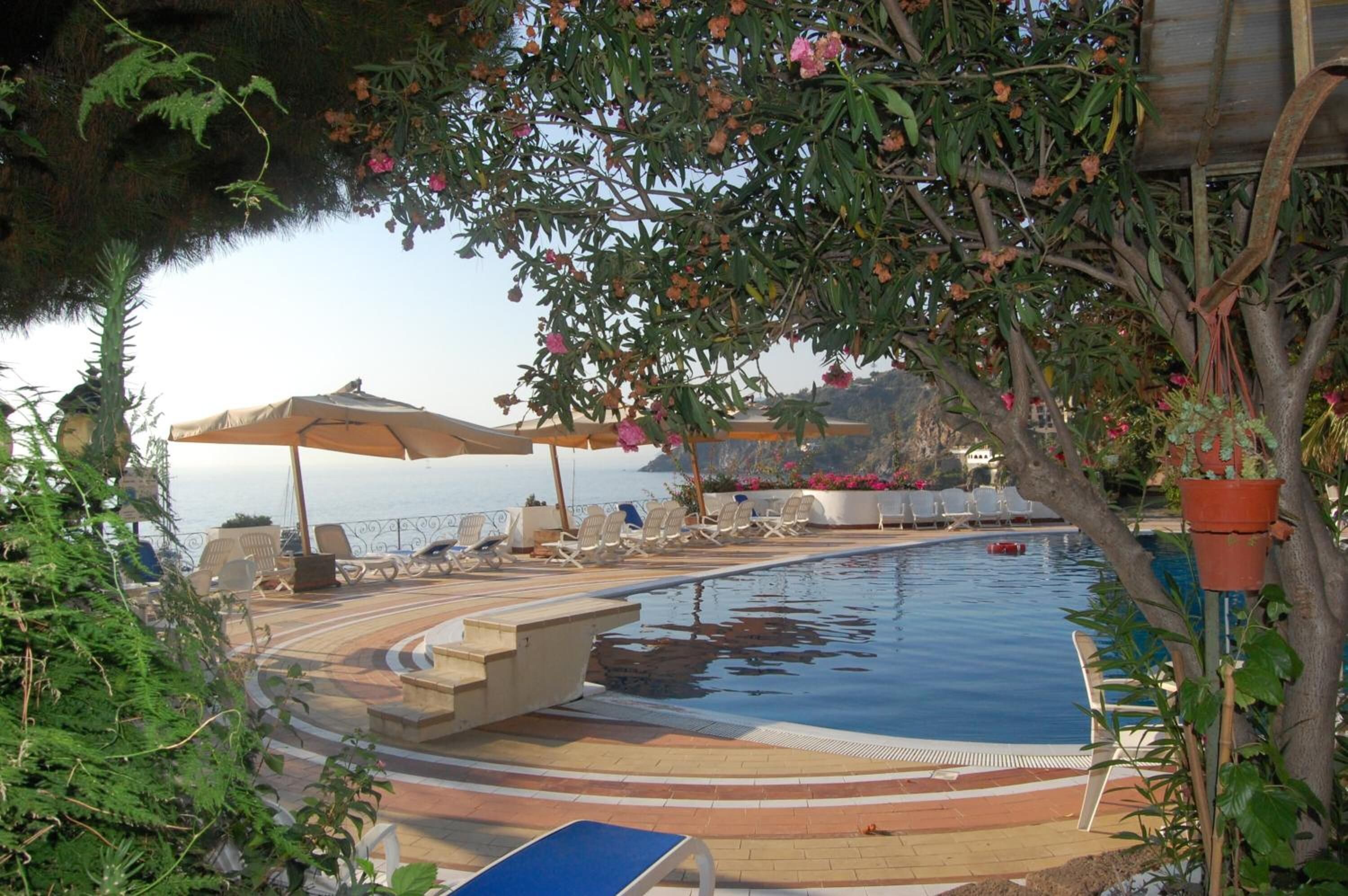 2 outdoor pools, pool umbrellas, pool loungers