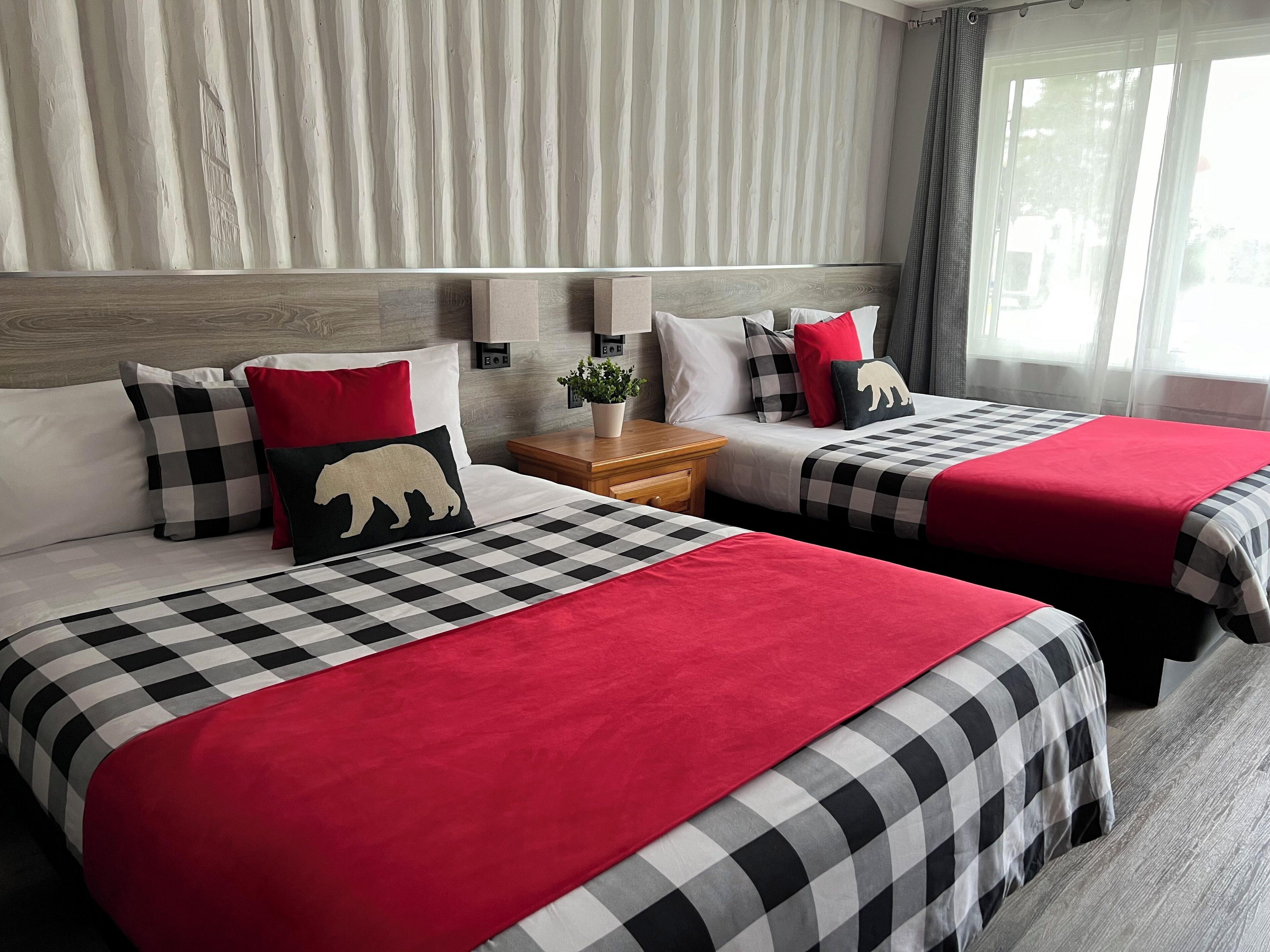 Family Room, 2 Queen Beds | Individually decorated, desk, iron/ironing board, free WiFi