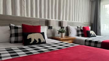 Family Room, 2 Queen Beds | Individually decorated, desk, iron/ironing board, free WiFi