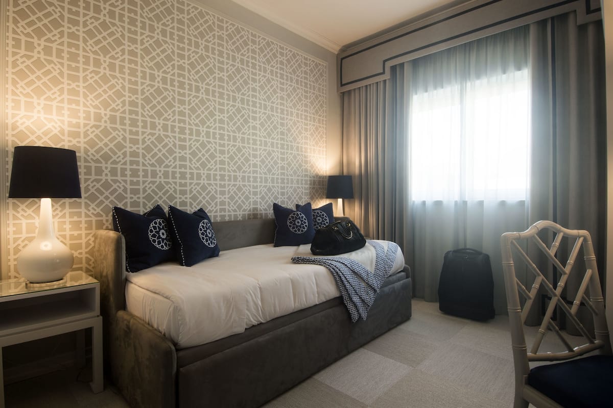 triple room | down duvets, desk, blackout curtains, soundproofing