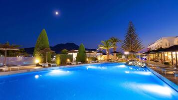 2 outdoor pools, open 10:30 AM to 7:00 PM, pool umbrellas