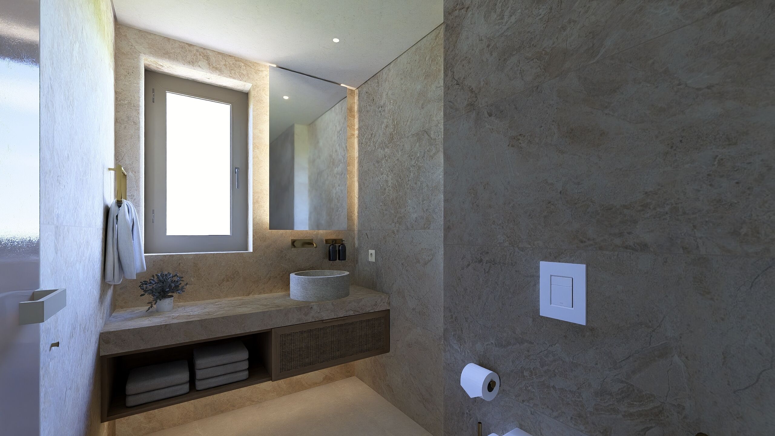 Un baño moderno con un espejo grande, un lavamanos redondo y un perchero para toallas.