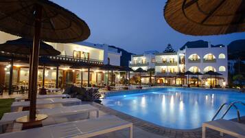 2 outdoor pools, open 10:30 AM to 7:00 PM, pool umbrellas