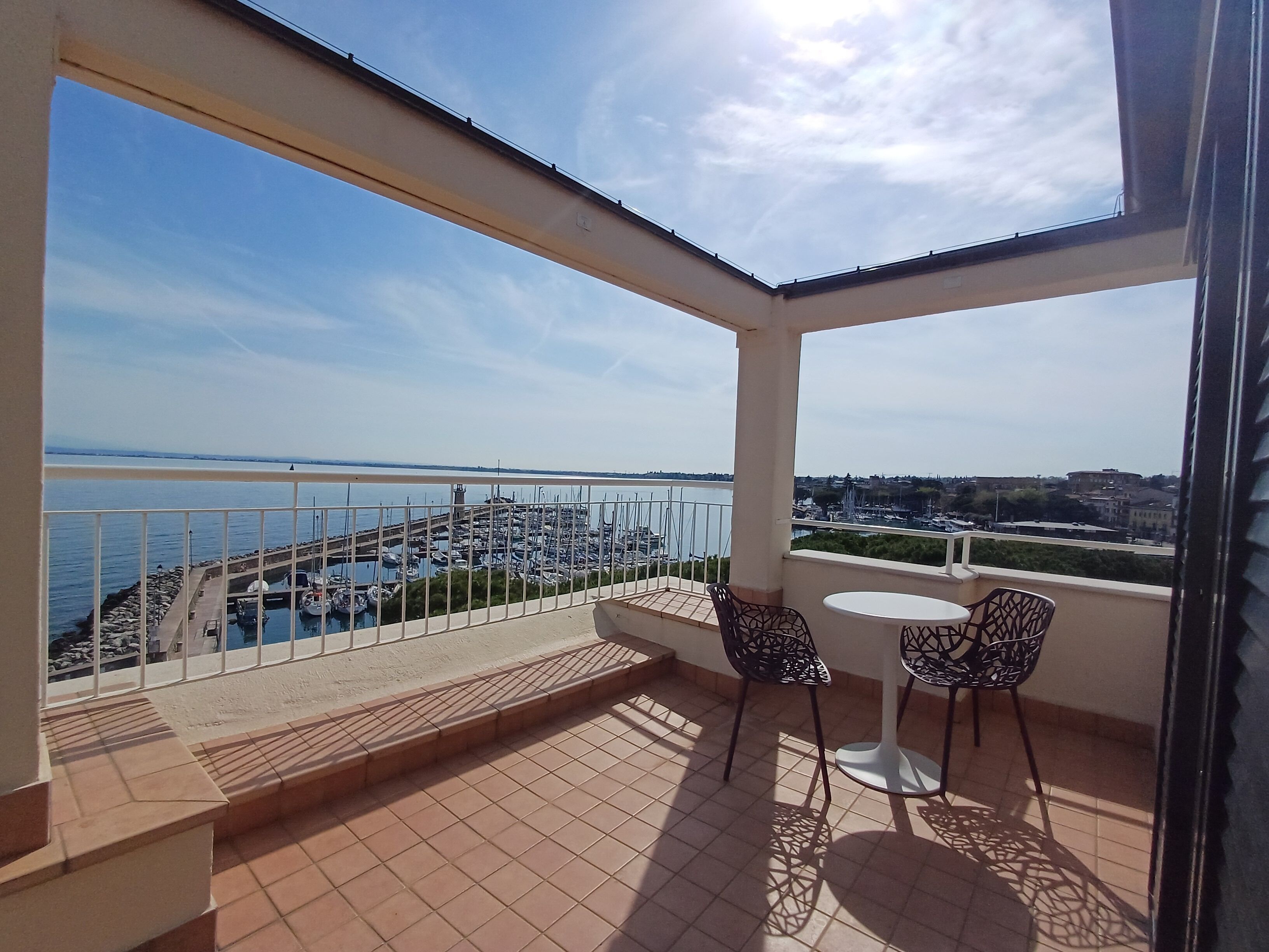 superior double or twin room, terrace, lake view | terrace/patio