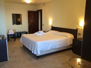 Standard Double Room, Terrace, Sea Facing | Minibar, in-room safe, desk