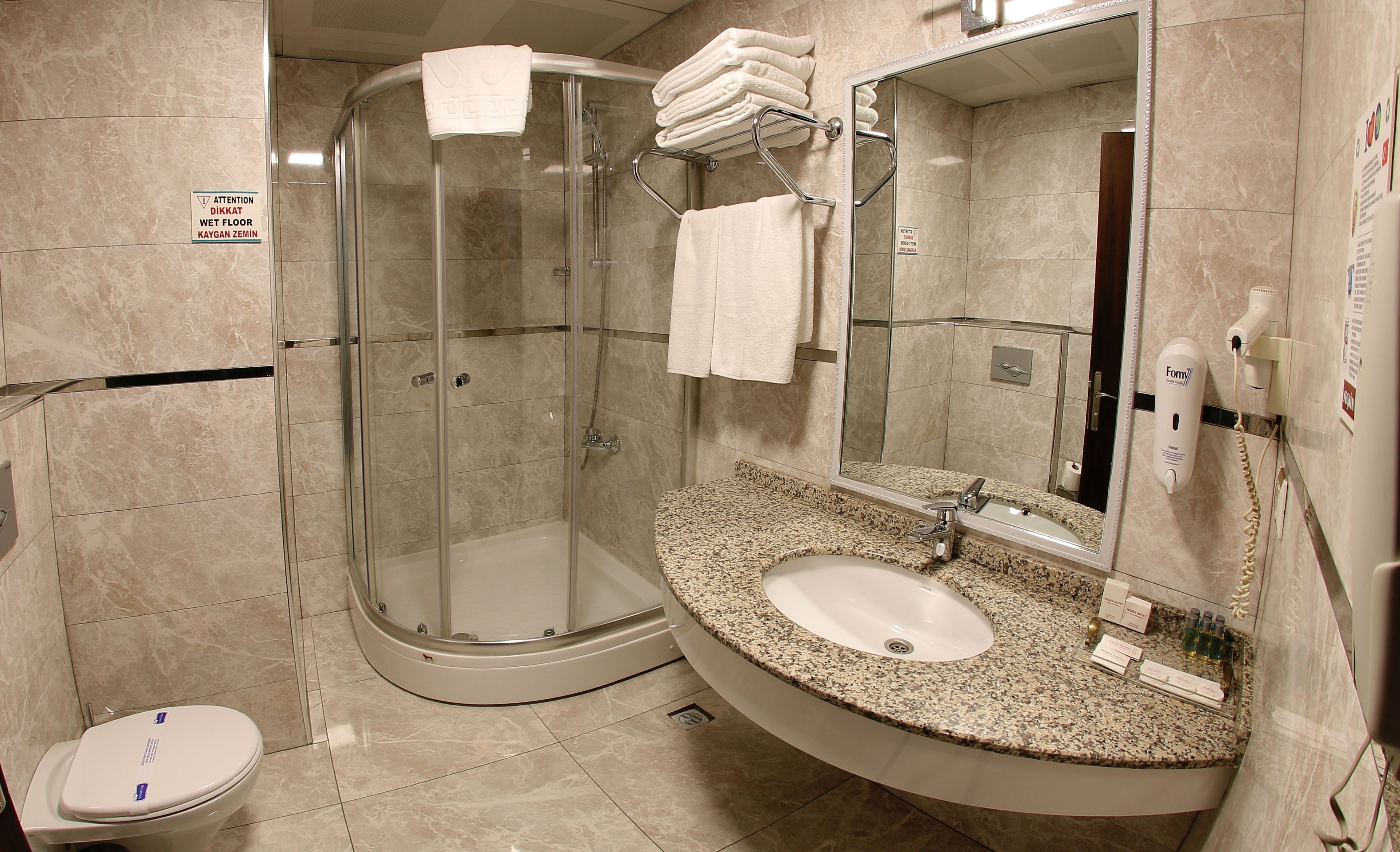 free toiletries, hair dryer, slippers, towels