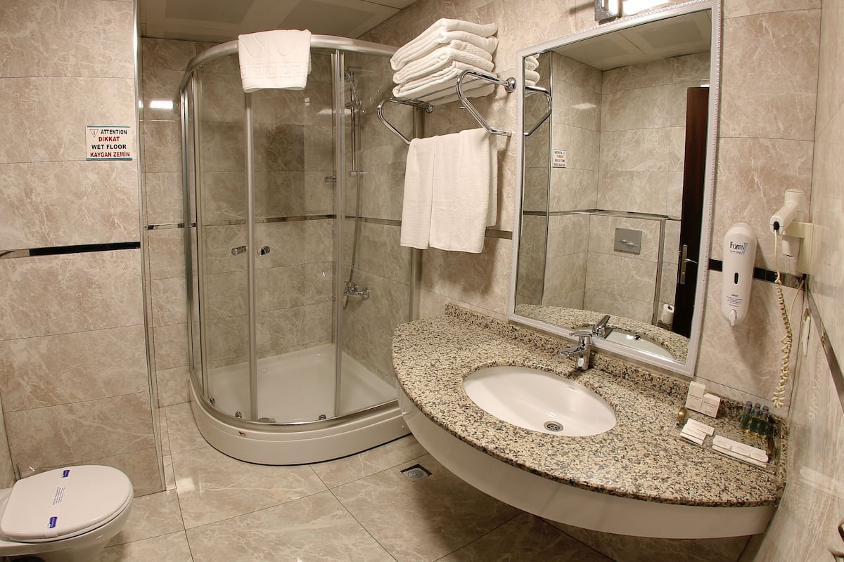 free toiletries, hair dryer, slippers, towels