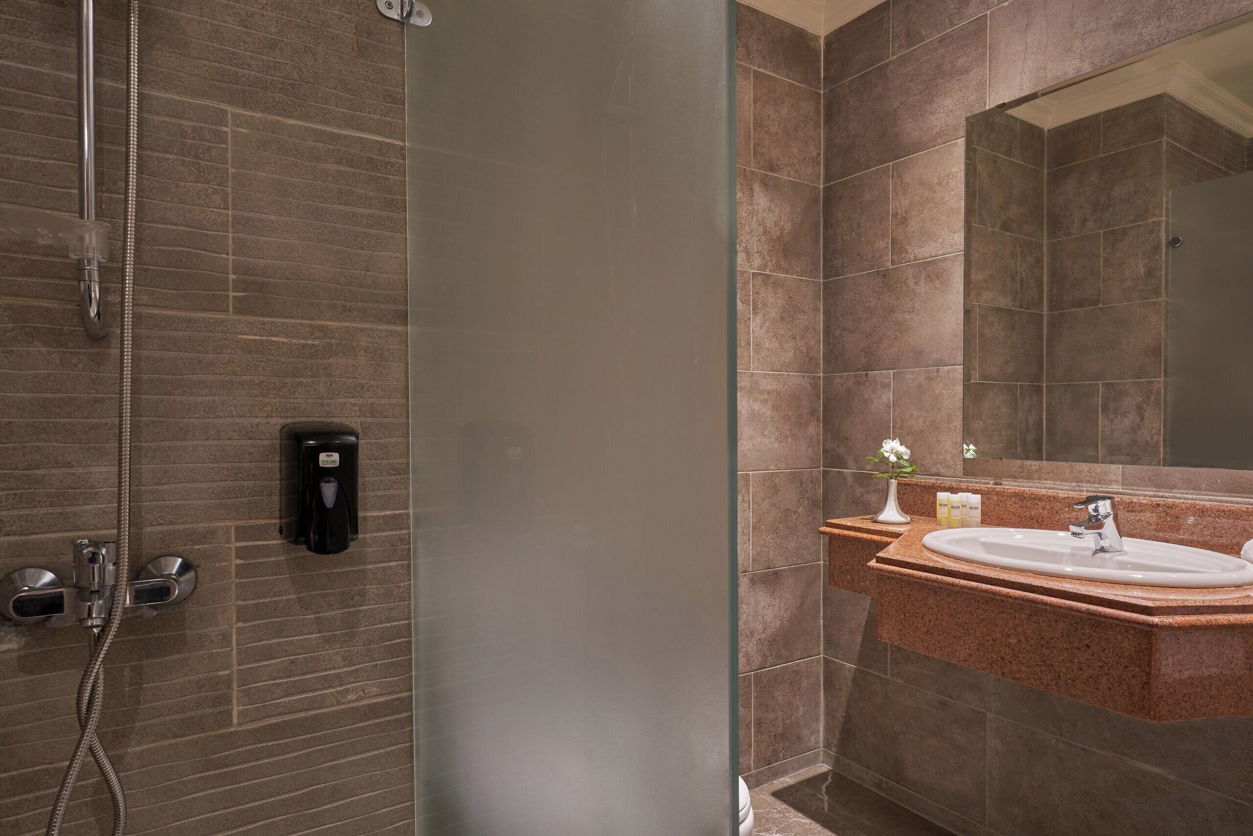 comfort grand room | bathroom | shower, hair dryer, towels, soap