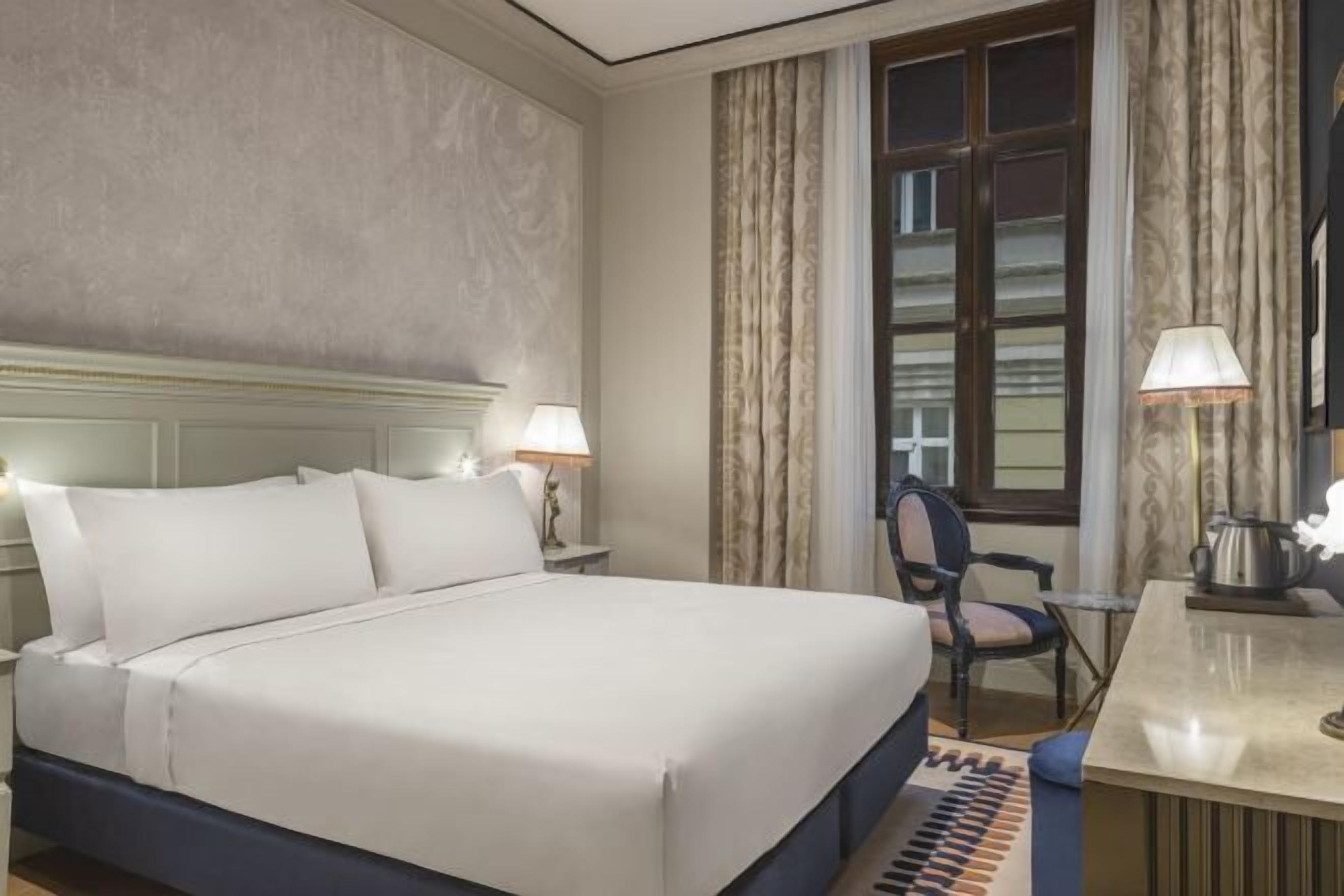 Egyptian cotton sheets, premium bedding, down duvets, in-room safe