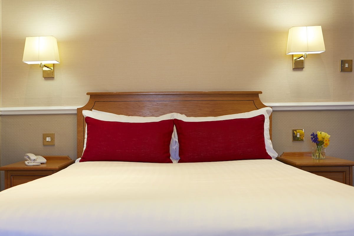 Premium bedding, desk, blackout drapes, iron/ironing board