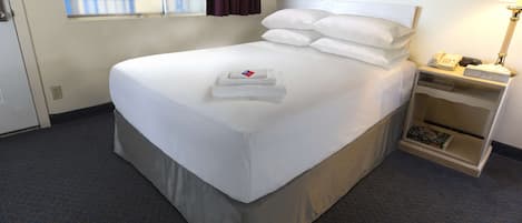 Premium bedding, pillow-top beds, desk, free WiFi