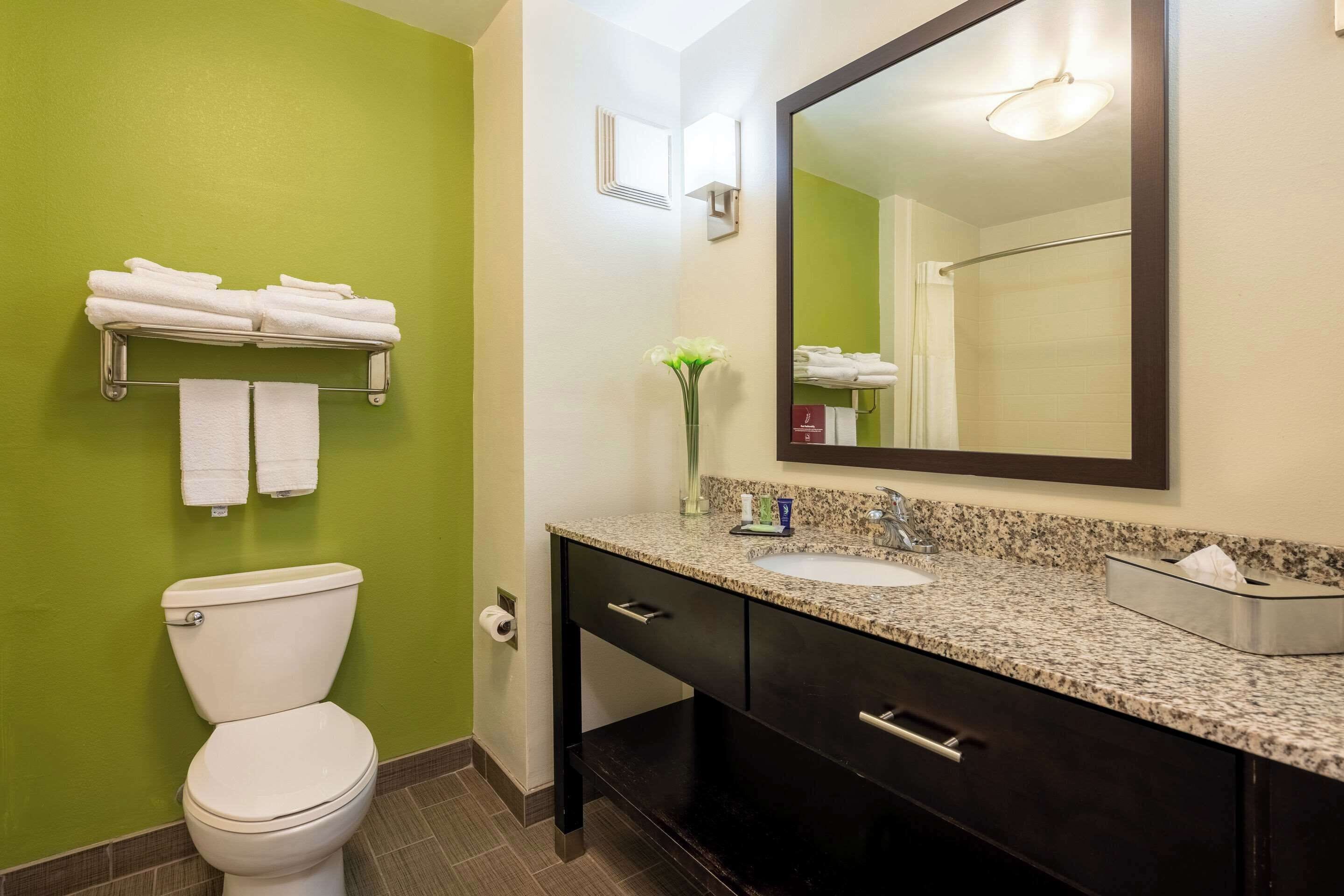 desk, laptop workspace, blackout curtains, iron/ironing board