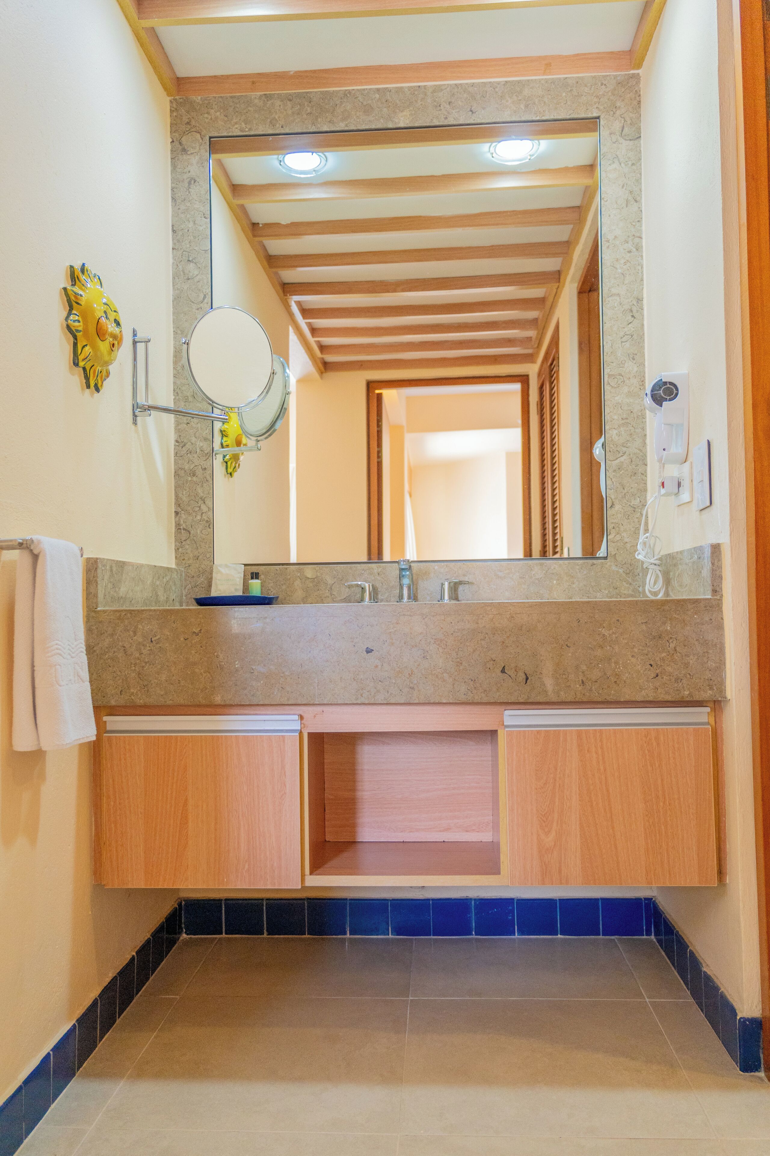 deluxe suite | bathroom | shower, rainfall showerhead, towels, soap