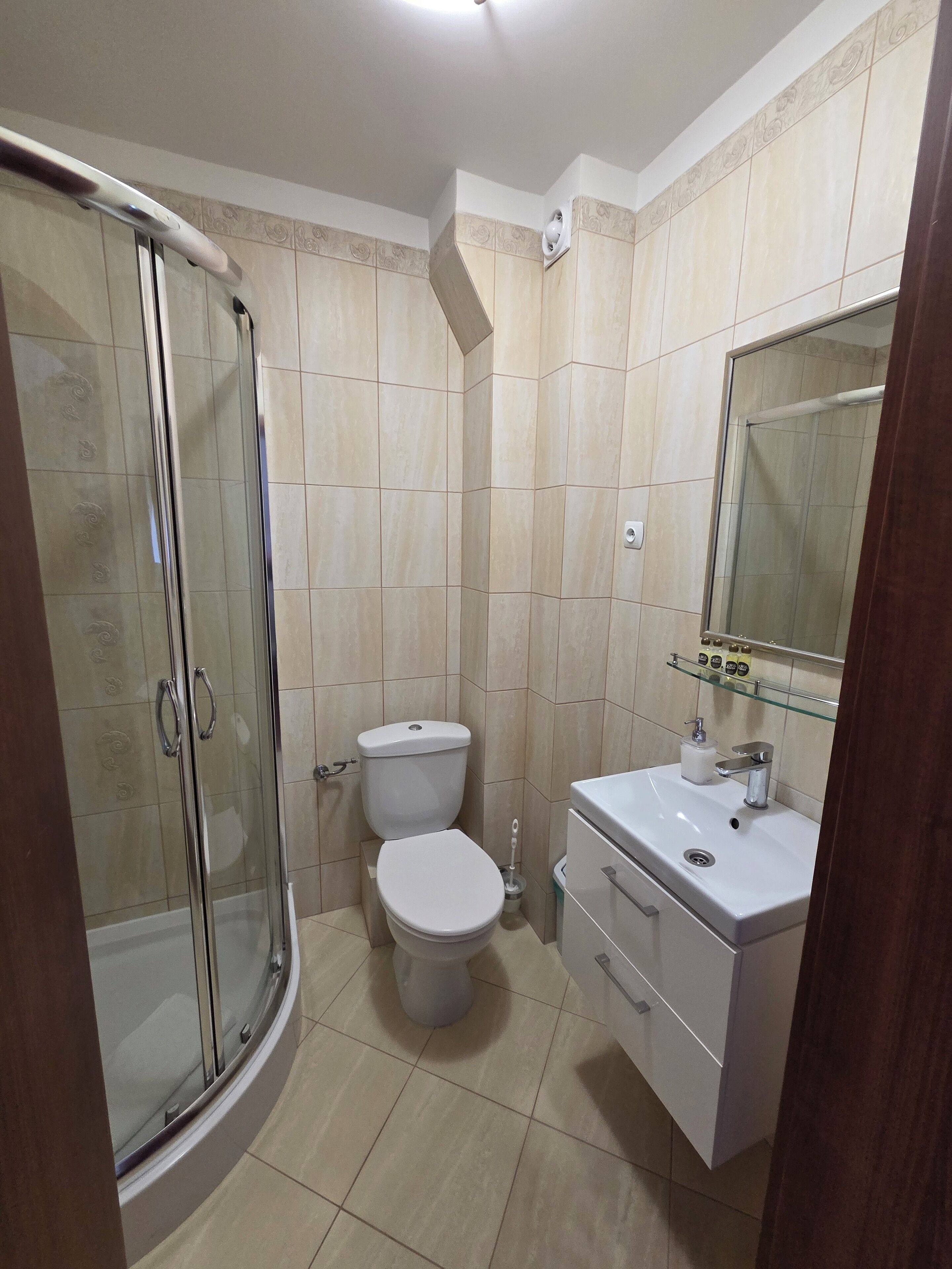 shower, designer toiletries, hair dryer, bathrobes