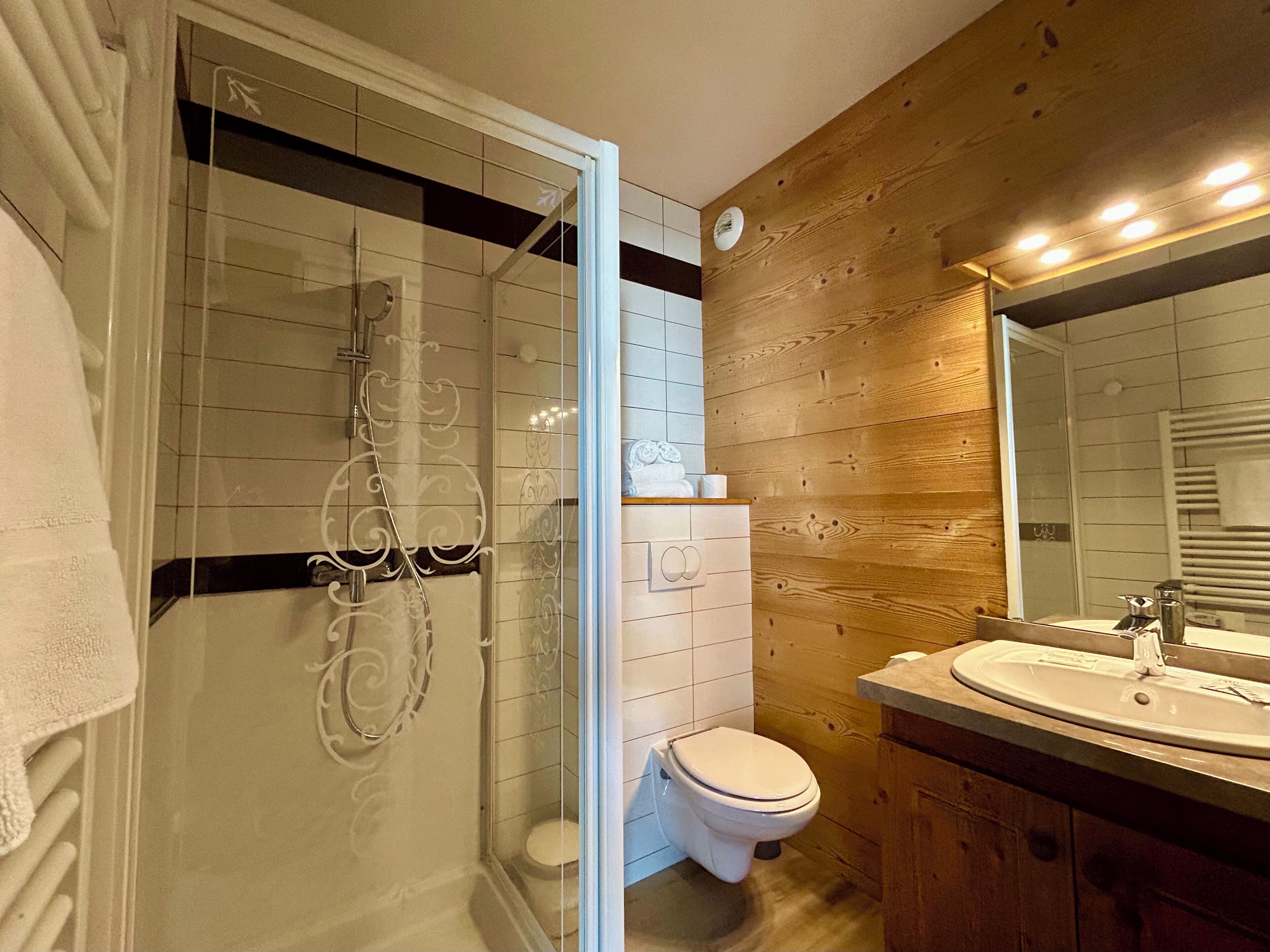 junior studio, 1 large single bed, kitchenette, garden area | bathroom | shower, hair dryer, towels, soap