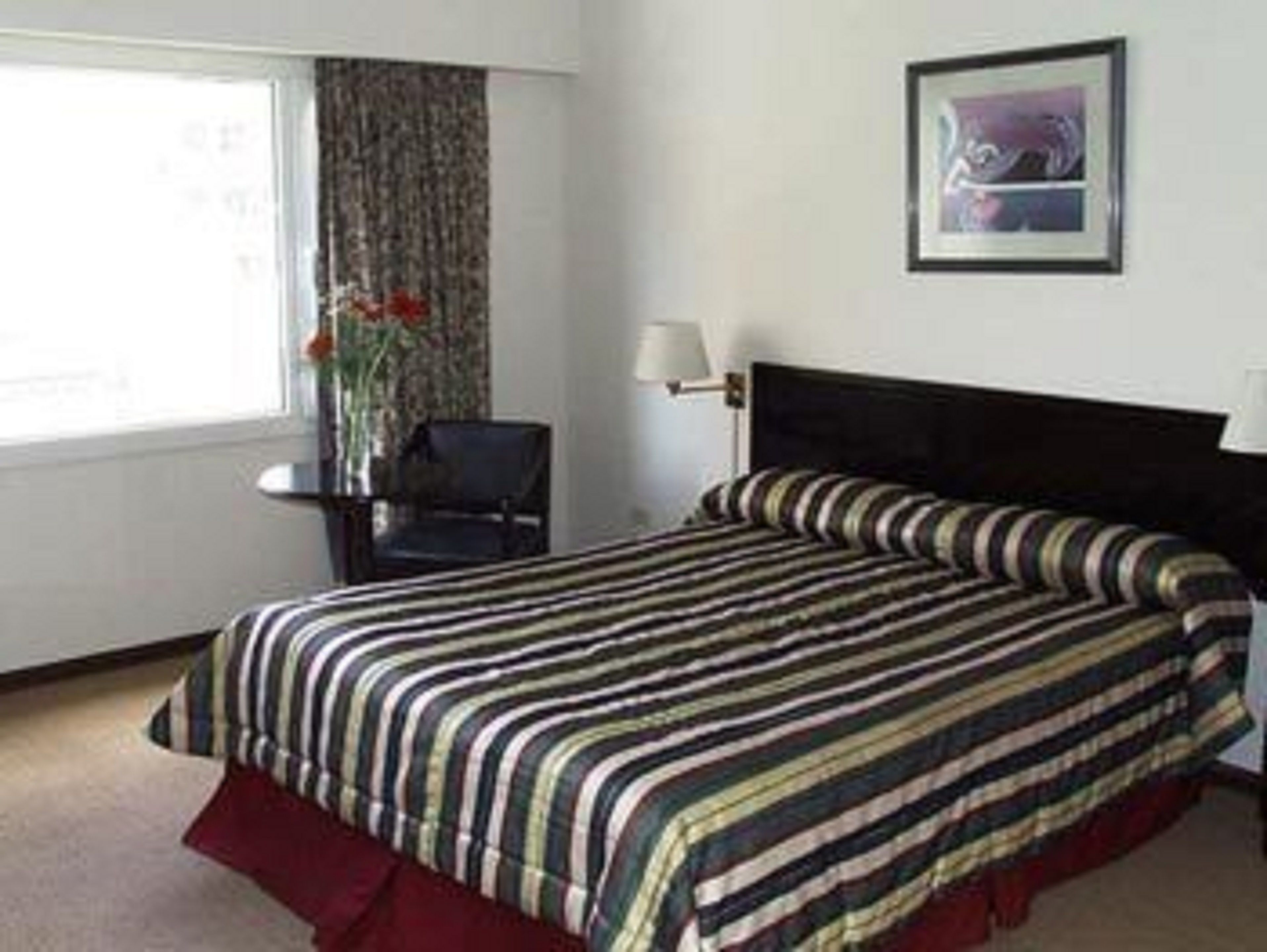 hypo-allergenic bedding, down duvets, in-room safe