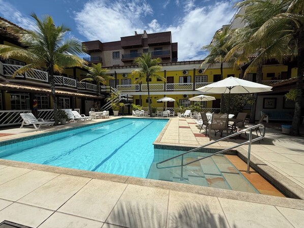 Outdoor pool, pool umbrellas, pool loungers