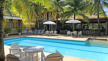 Outdoor pool, pool umbrellas, sun loungers