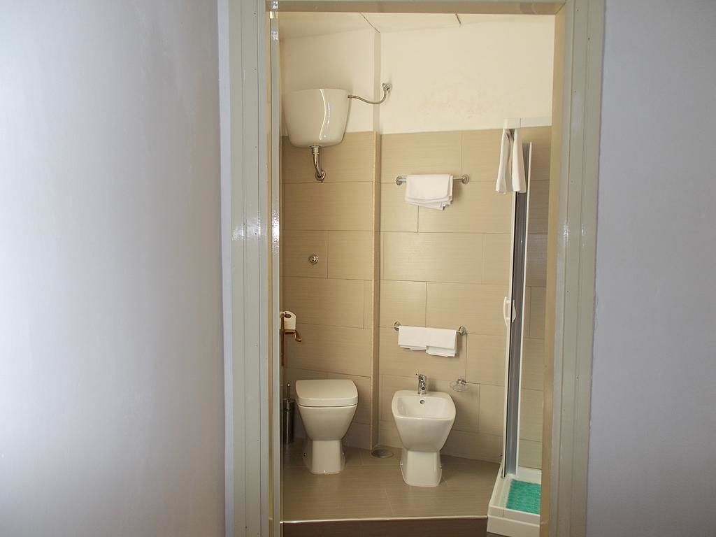 rainfall showerhead, hair dryer, bathrobes, slippers