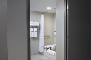 Designer toiletries, hair dryer, towels, soap