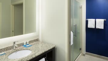 Designer toiletries, hair dryer, towels, soap