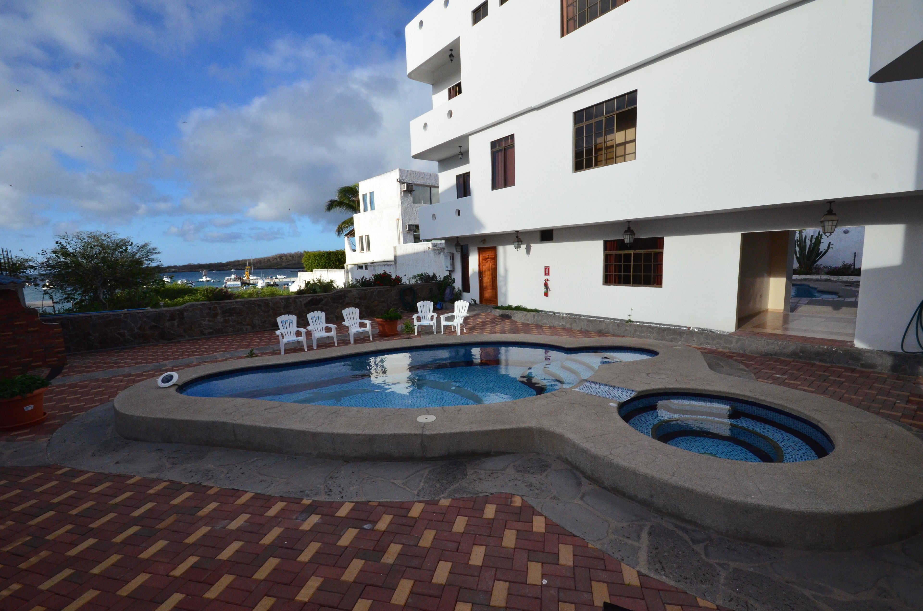 2 outdoor pools, open 8:00 am to 7:00 pm, pool loungers