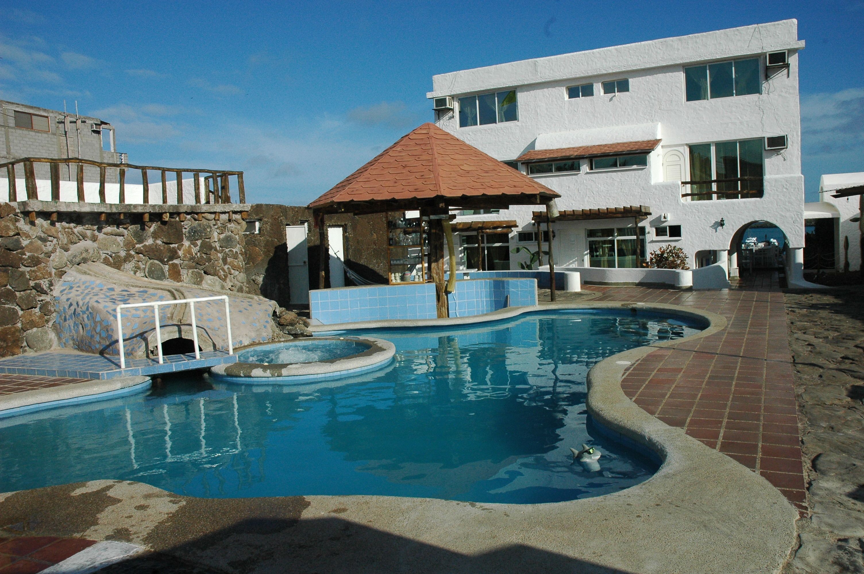 2 outdoor pools, open 8:00 am to 7:00 pm, pool loungers