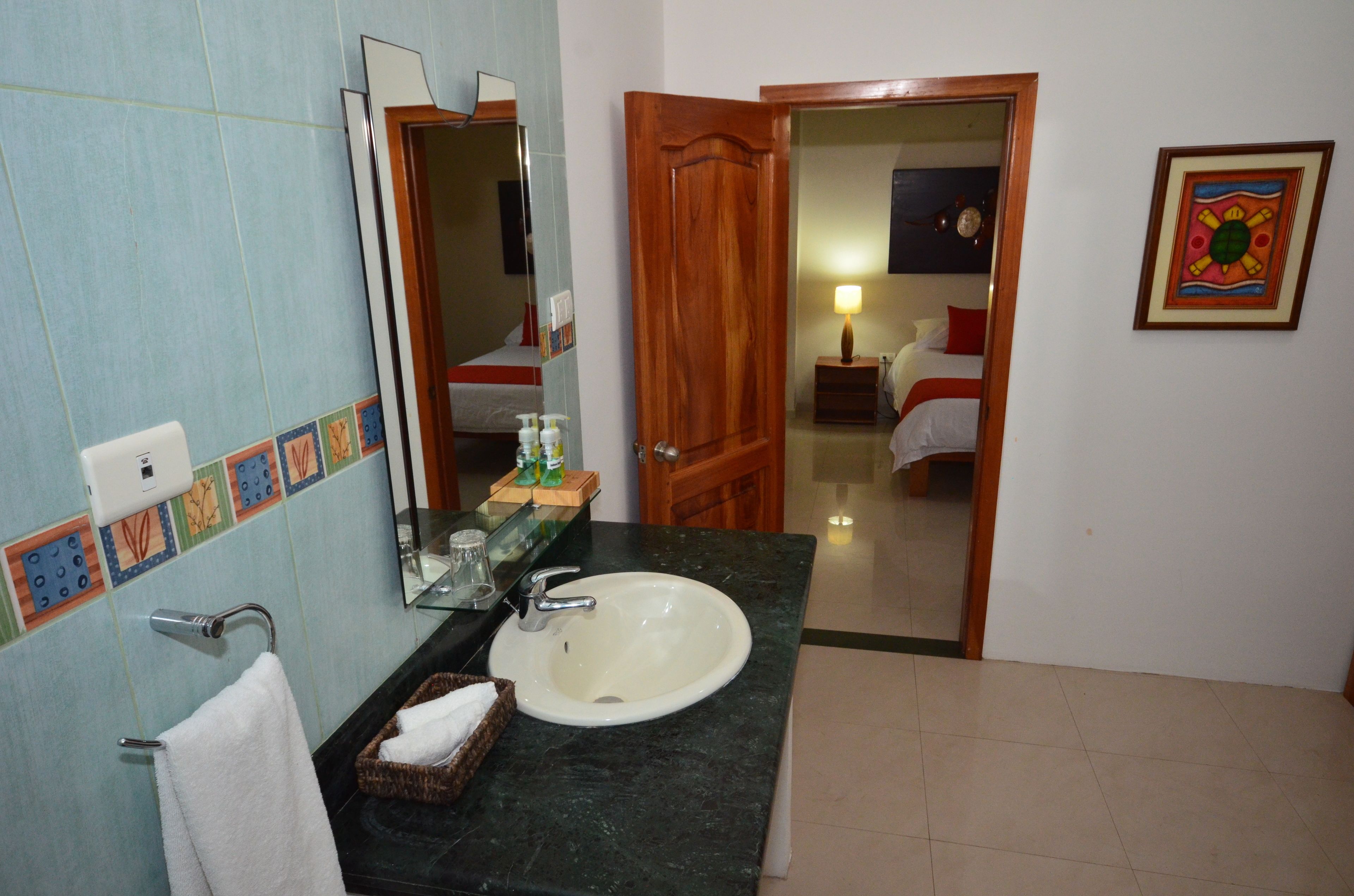 standard double room, poolside | bathroom | shower, rainfall showerhead, hair dryer, towels
