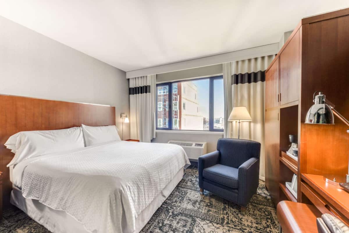 down duvets, pillow-top beds, in-room safe, laptop workspace