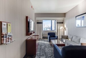Down duvets, pillow-top beds, in-room safe, laptop workspace