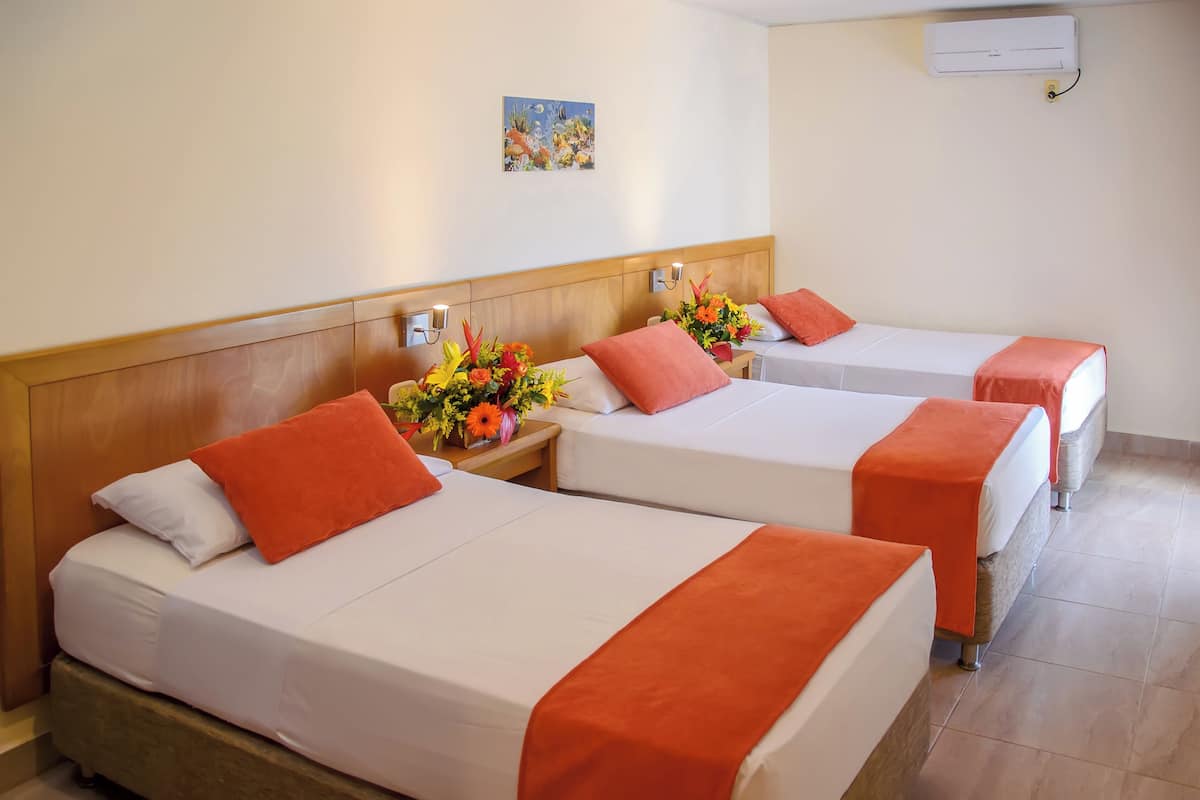 Triple Room | Premium bedding, minibar, in-room safe, free WiFi