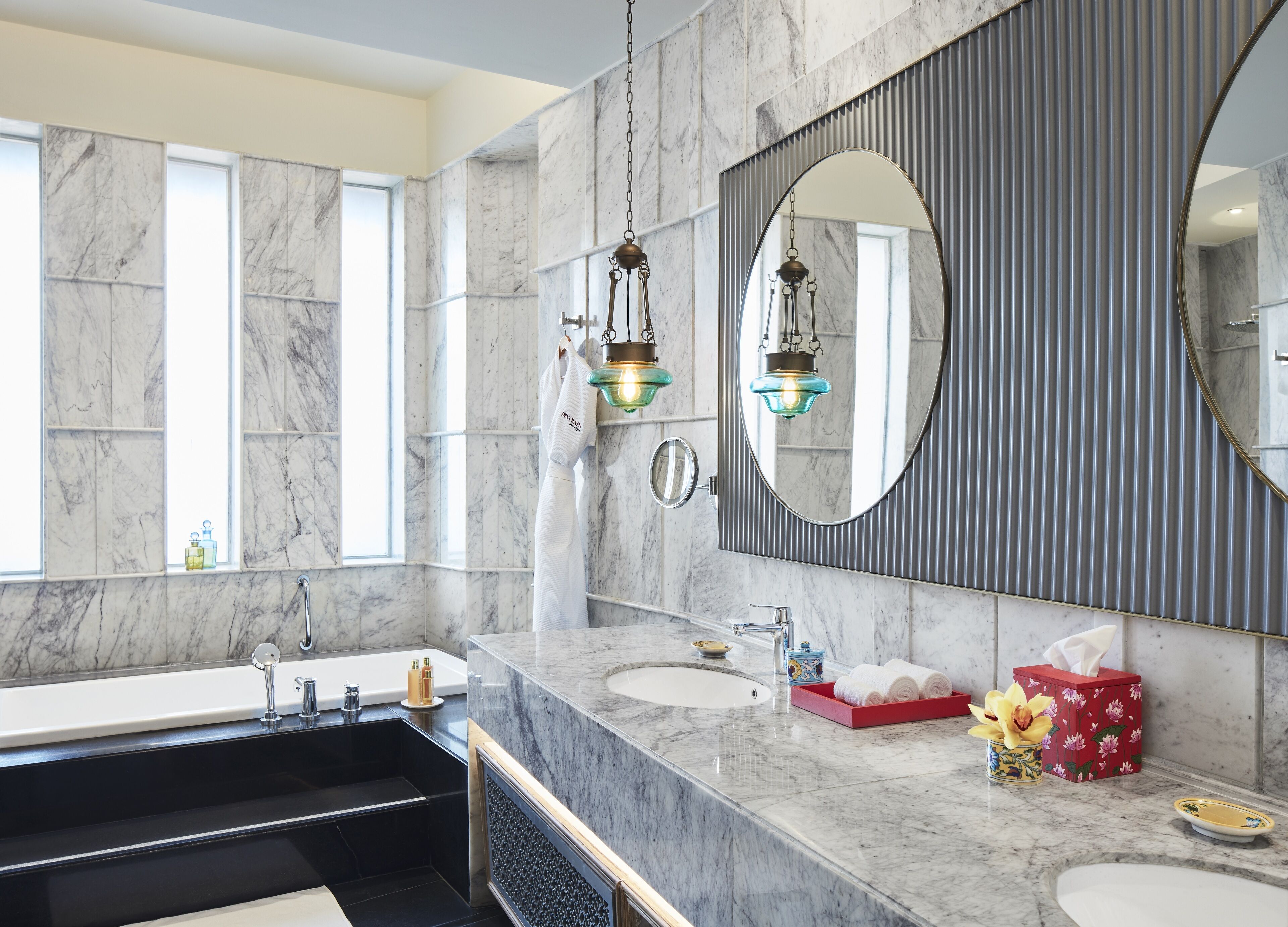 separate bathtub and shower, deep-soaking bathtub, designer toiletries