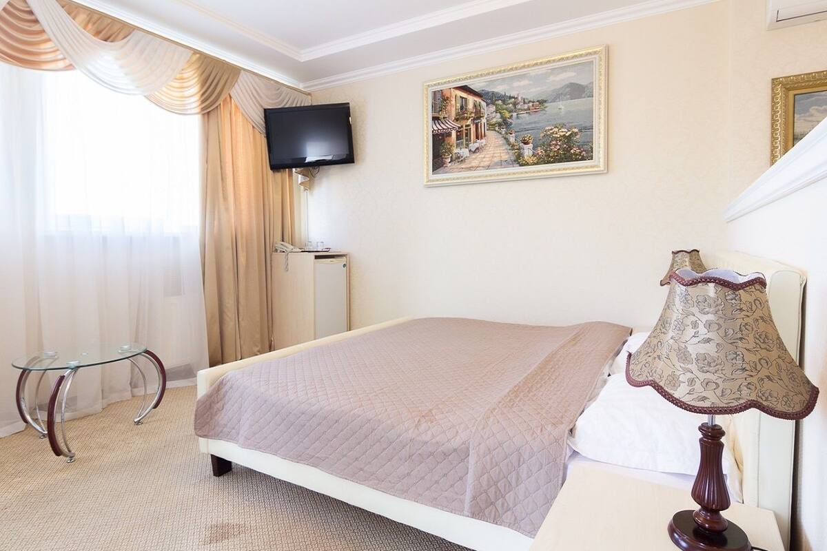 Suíte júnior, sacada, vista para o mar | Frigobar, cofres nos quartos, quartos à prova de som
