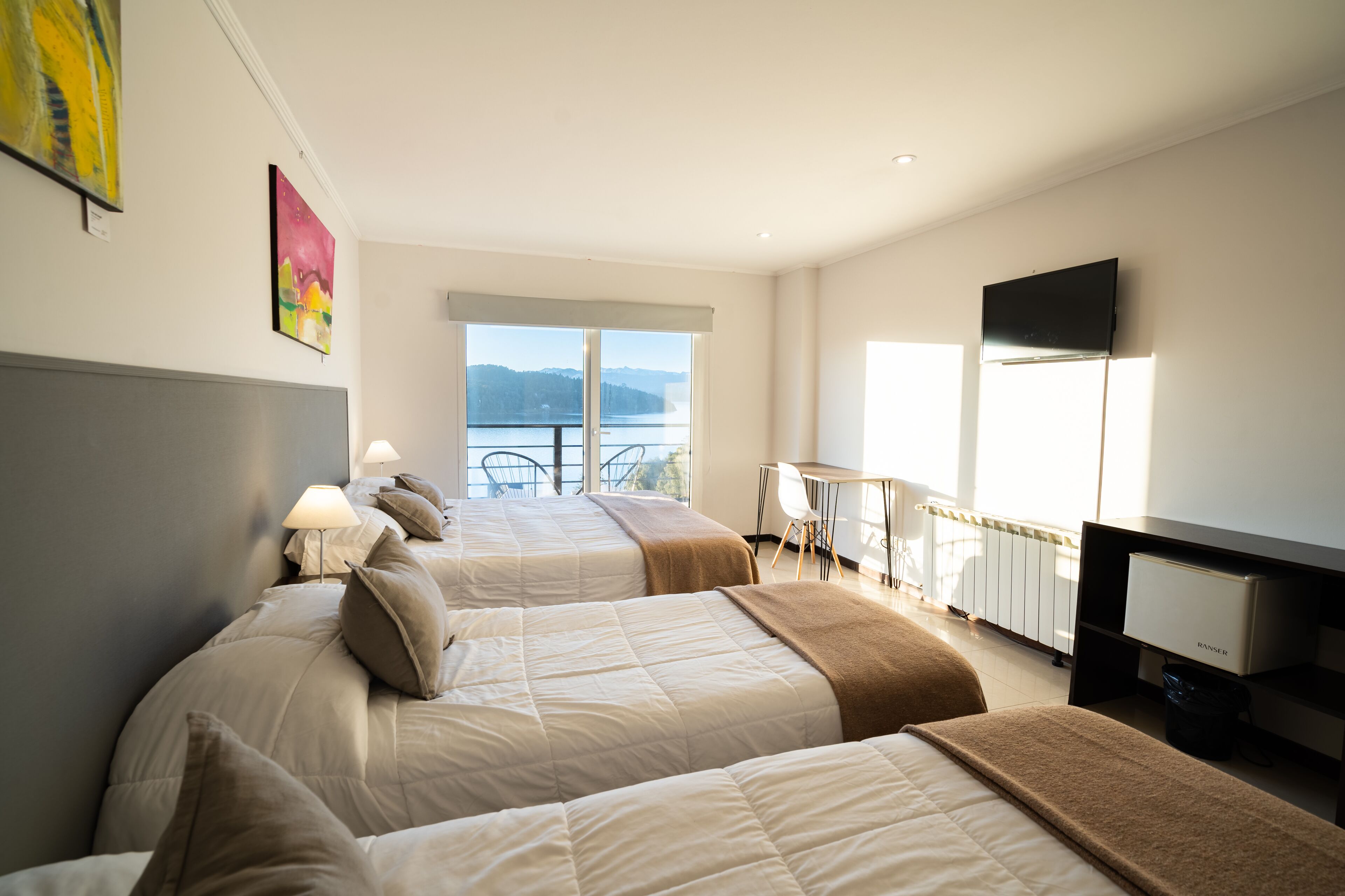 superior quadruple room, lake view | hypo-allergenic bedding, minibar, in-room safe, individually decorated