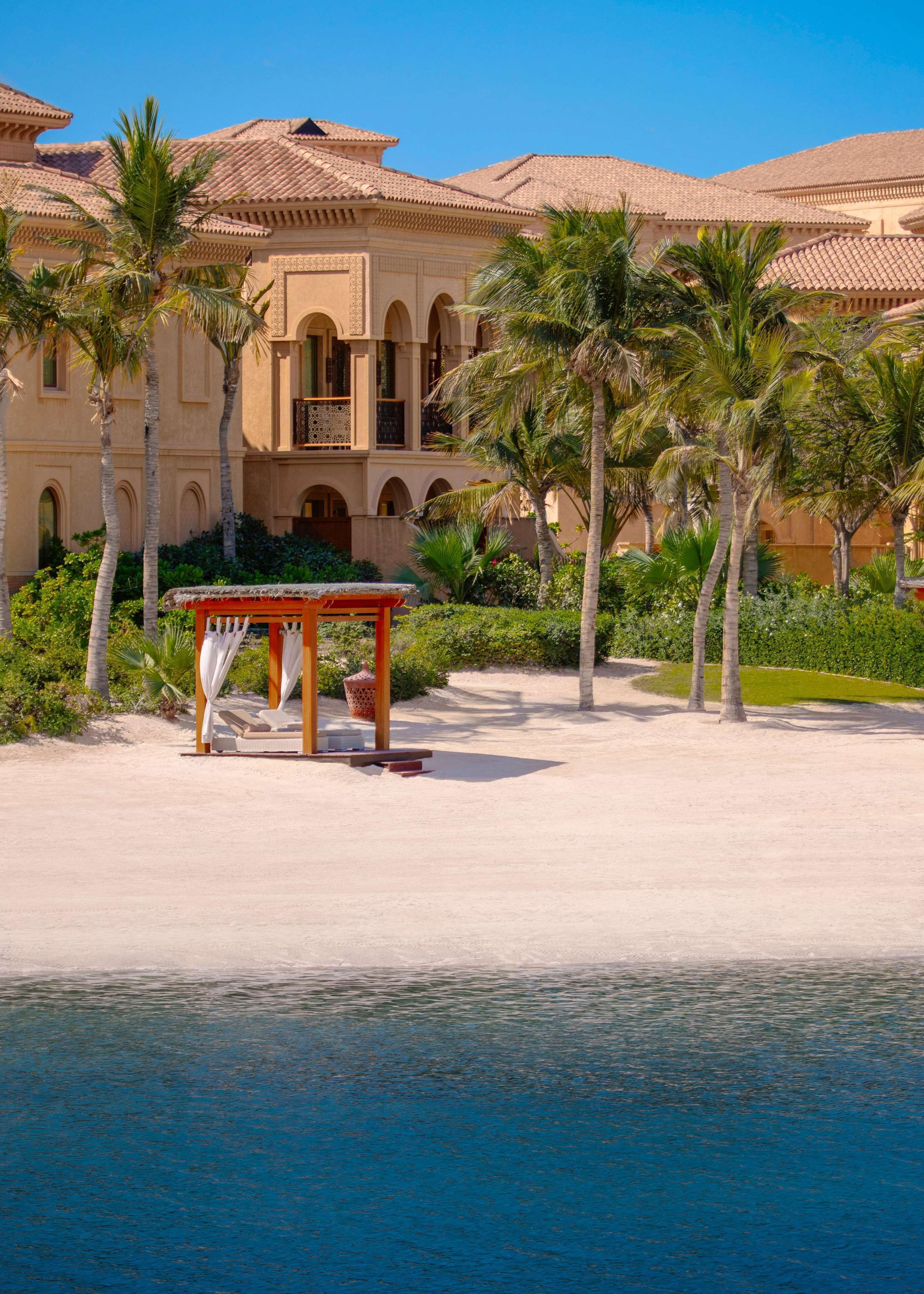 Private beach, white sand, sun-loungers, beach umbrellas