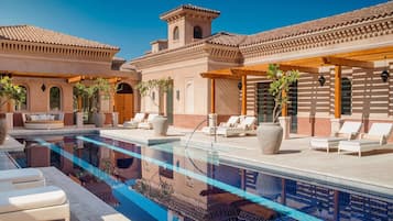 Outdoor pool, pool umbrellas, sun loungers