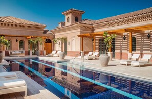 Outdoor pool, pool umbrellas, pool loungers