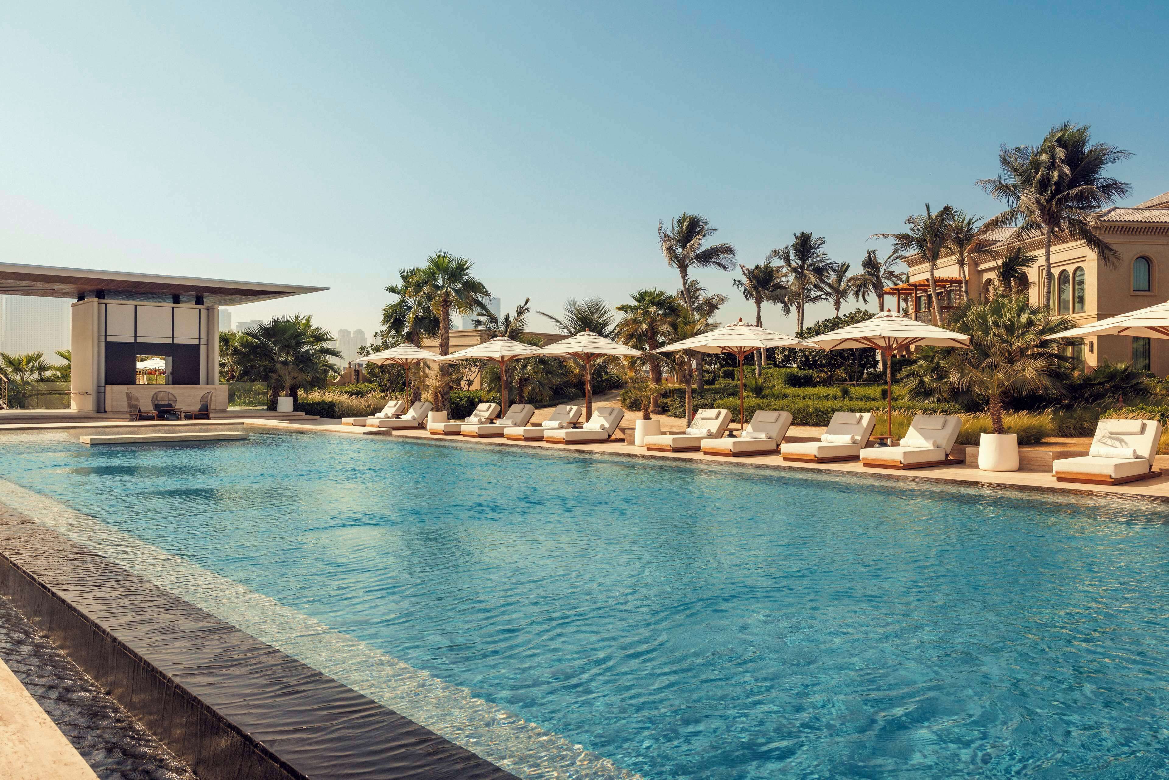 Outdoor pool, pool umbrellas, pool loungers